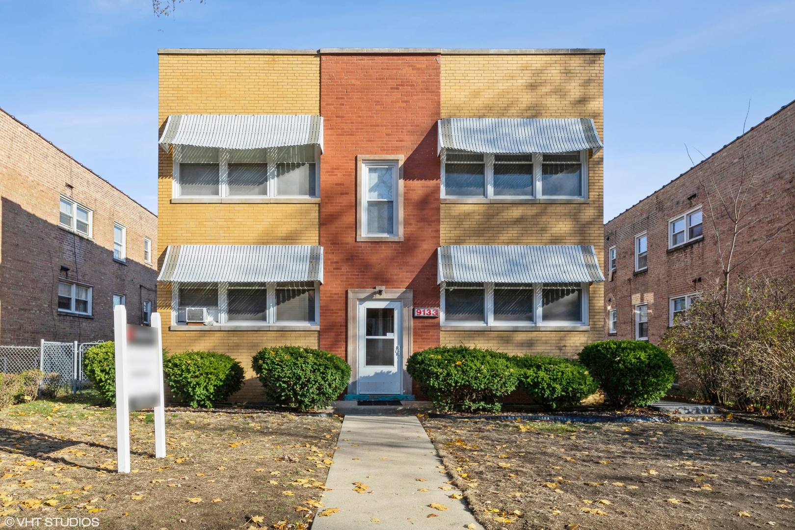 a view of a building with a street