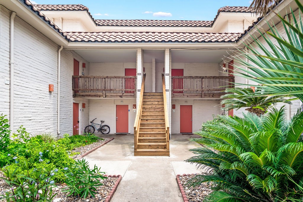 a front view of a house with a garage