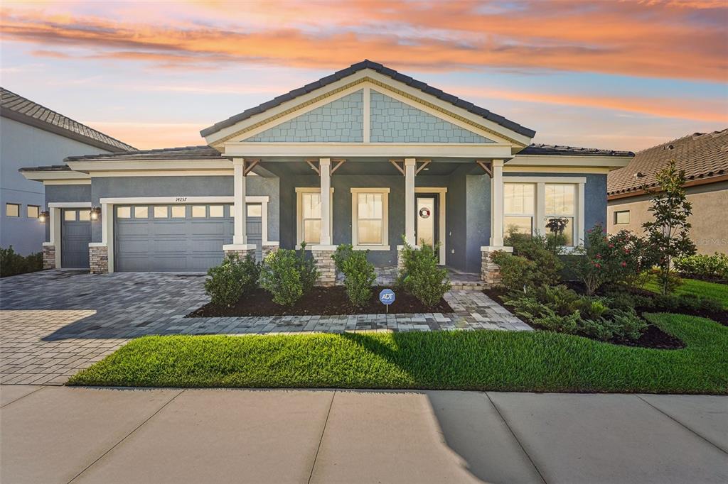 front view of a house and a yard