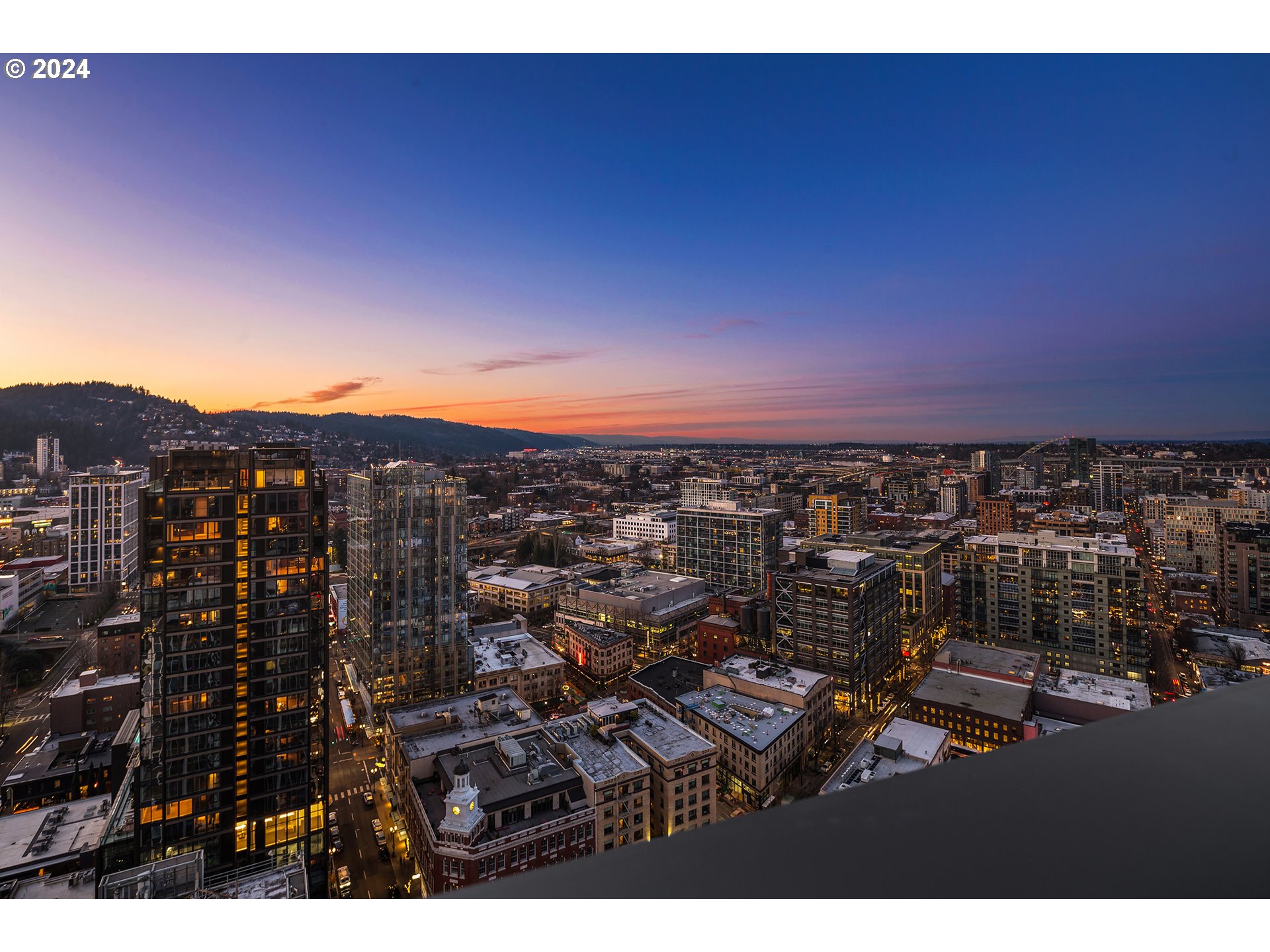 a view of city and mountain