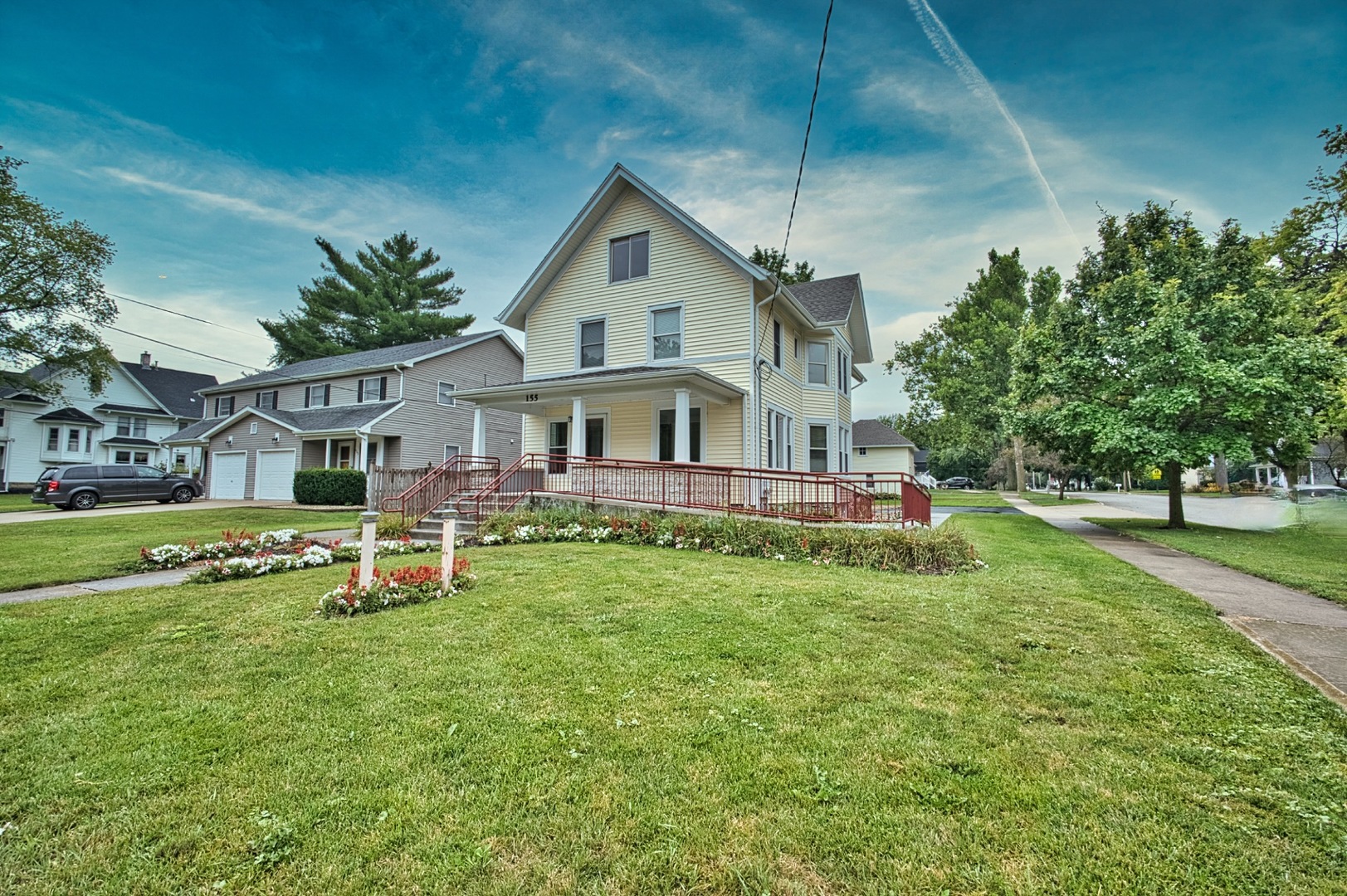 a view of a house with a big yard