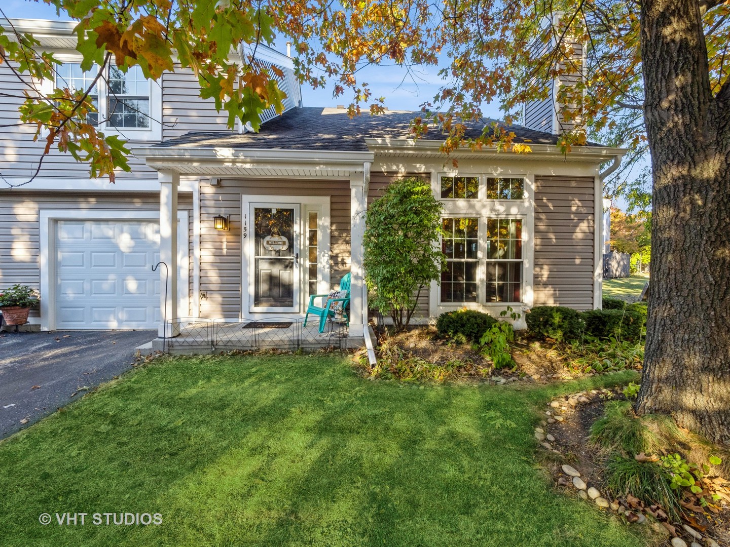 front view of a house with a yard