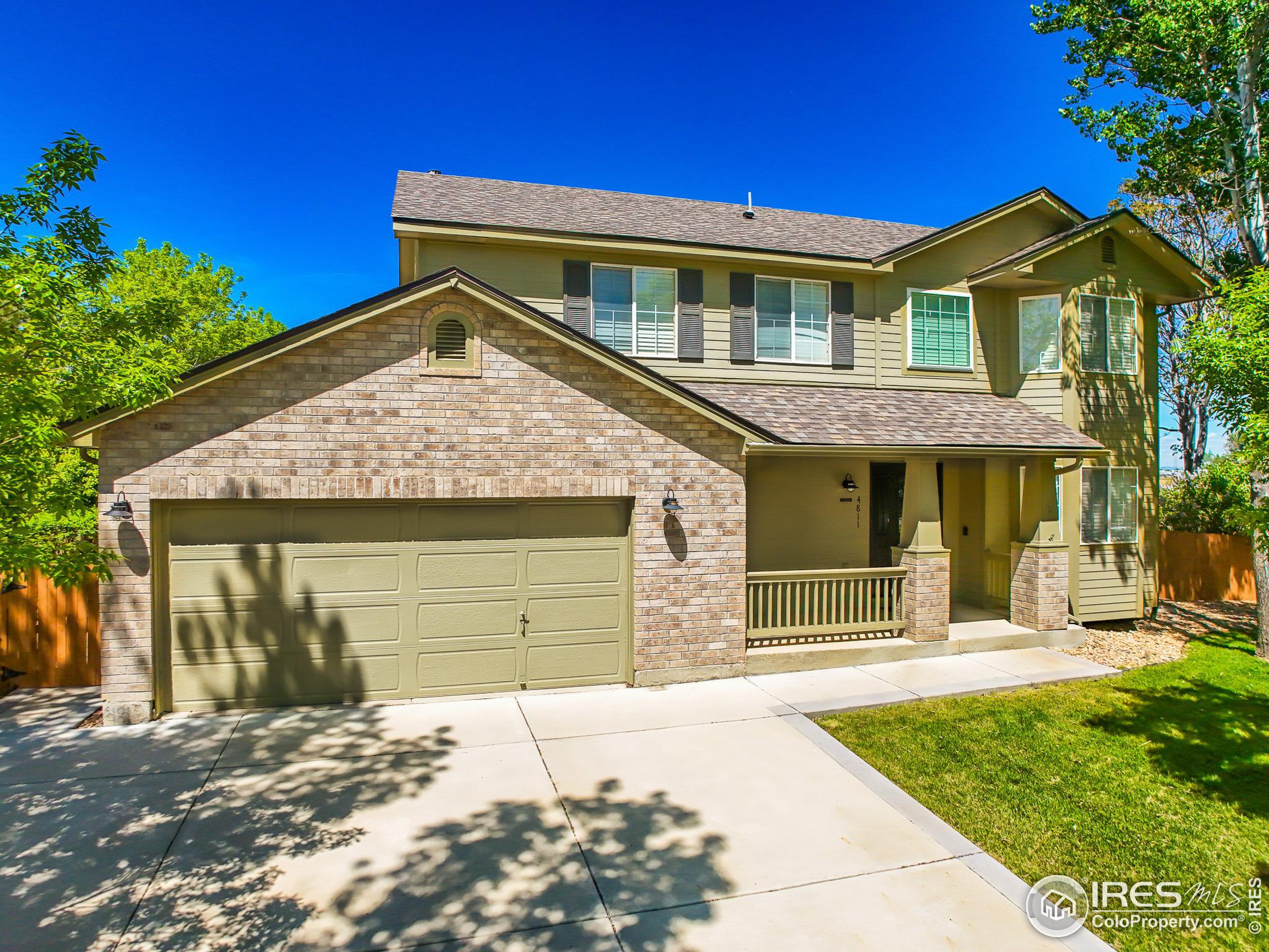 a front view of a house with a garage