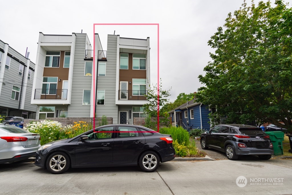 a car parked in front of a house