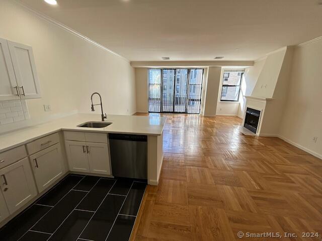 a kitchen with a sink and cabinets