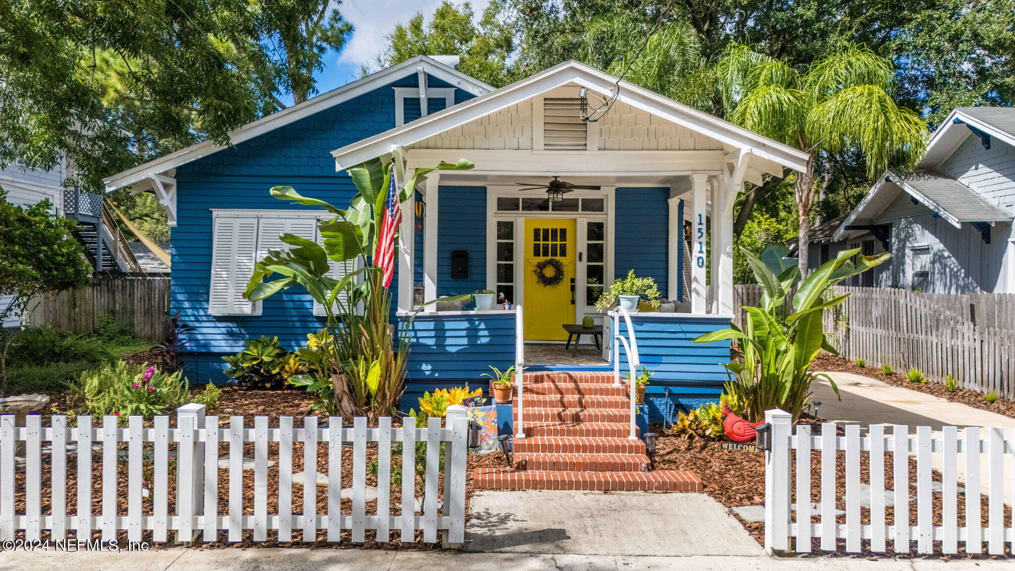 a front view of a house with a porch