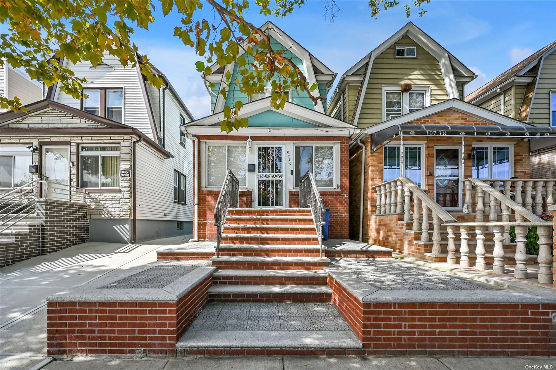 a front view of a house with a porch