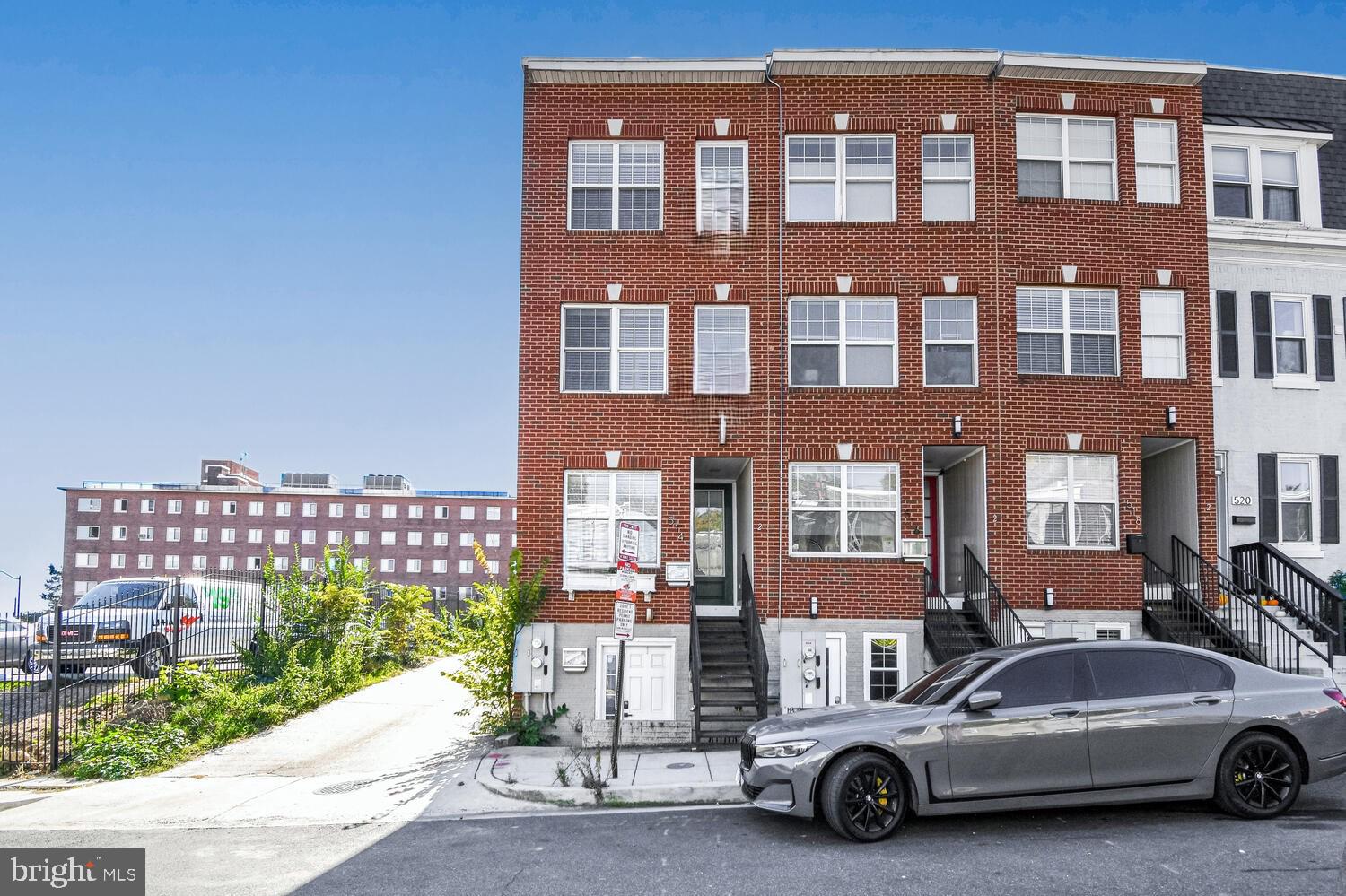 a car parked in front of a building