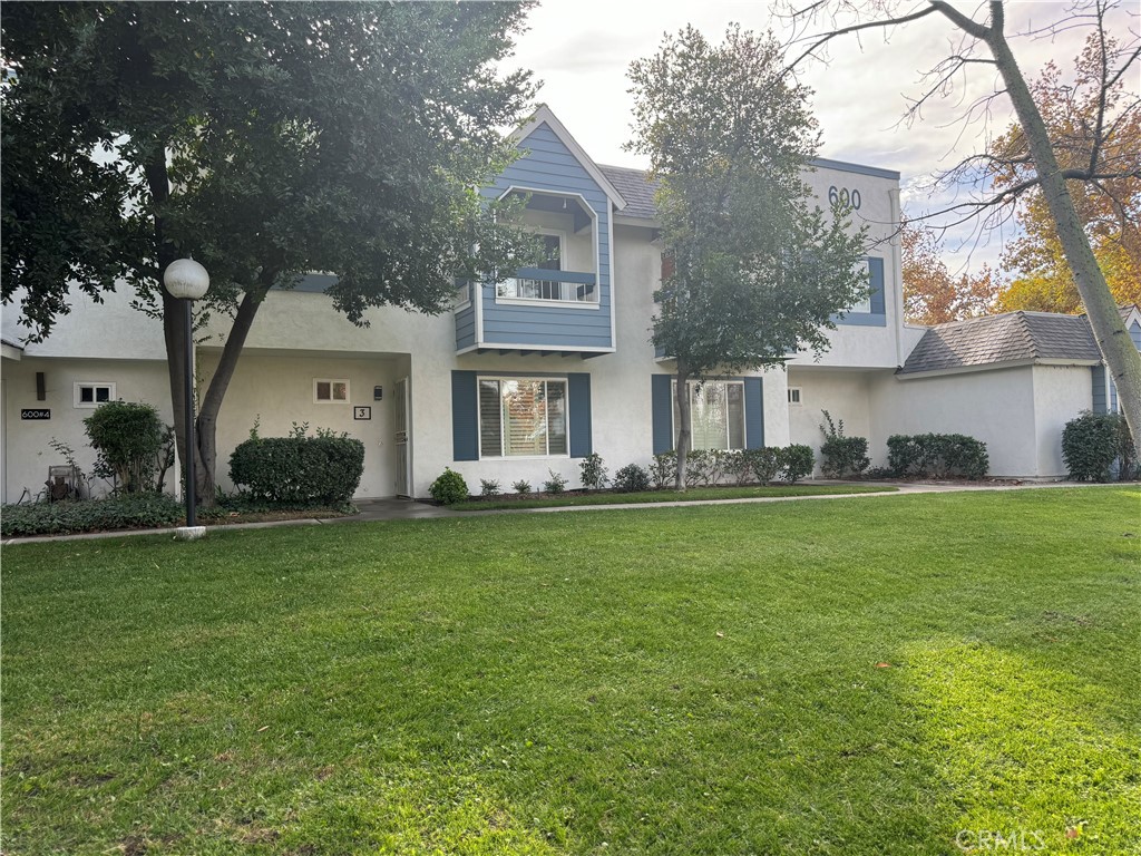 a house view with a garden space