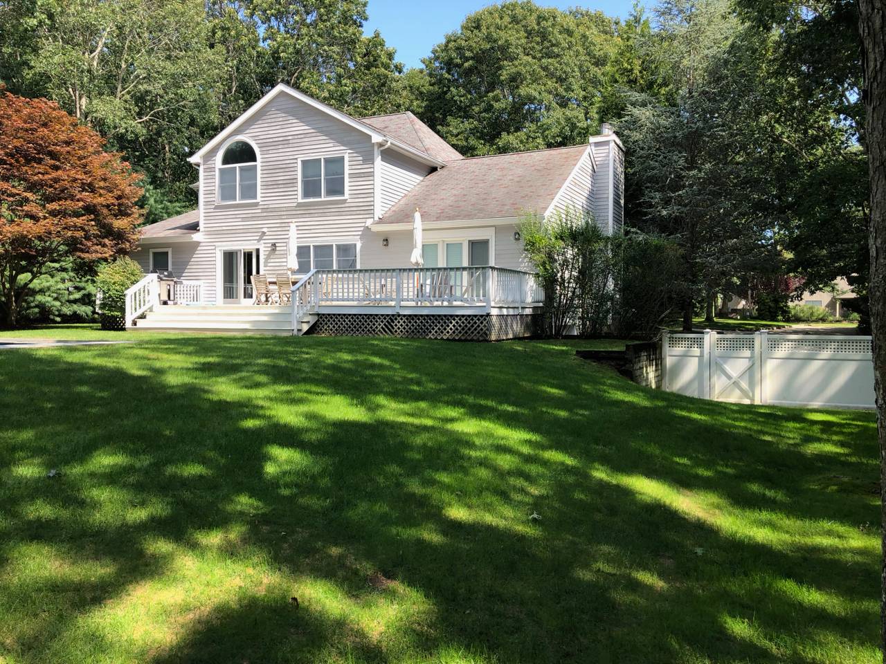 a view of a house with a big yard