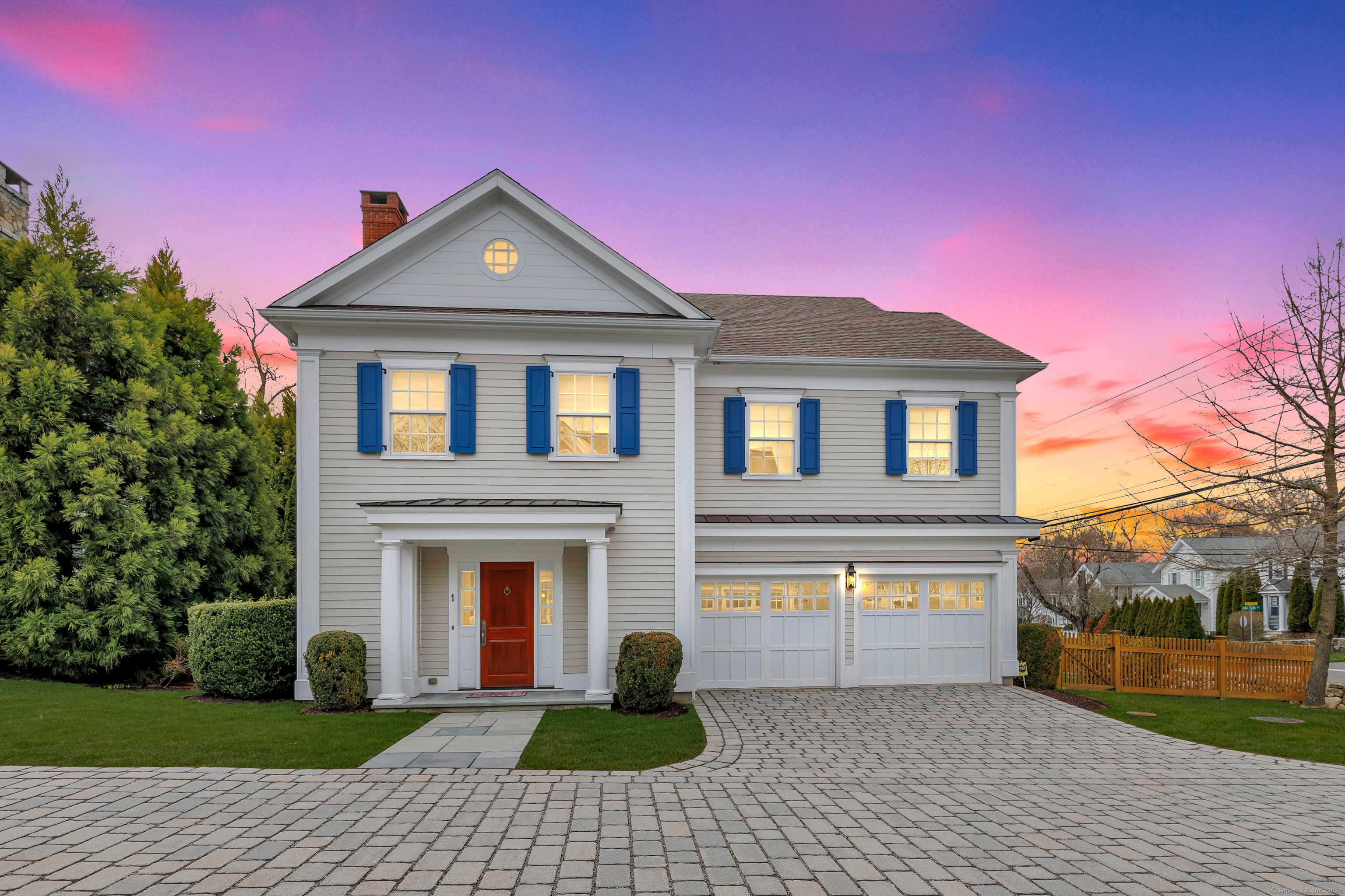 a front view of a house with yard