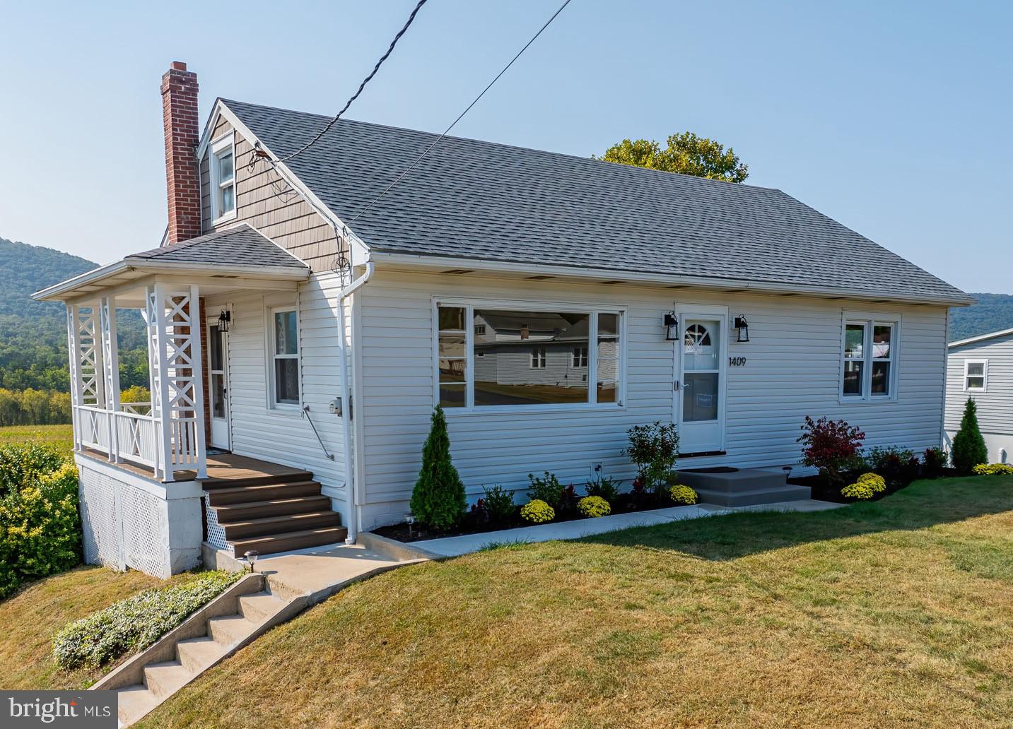 a front view of house with yard