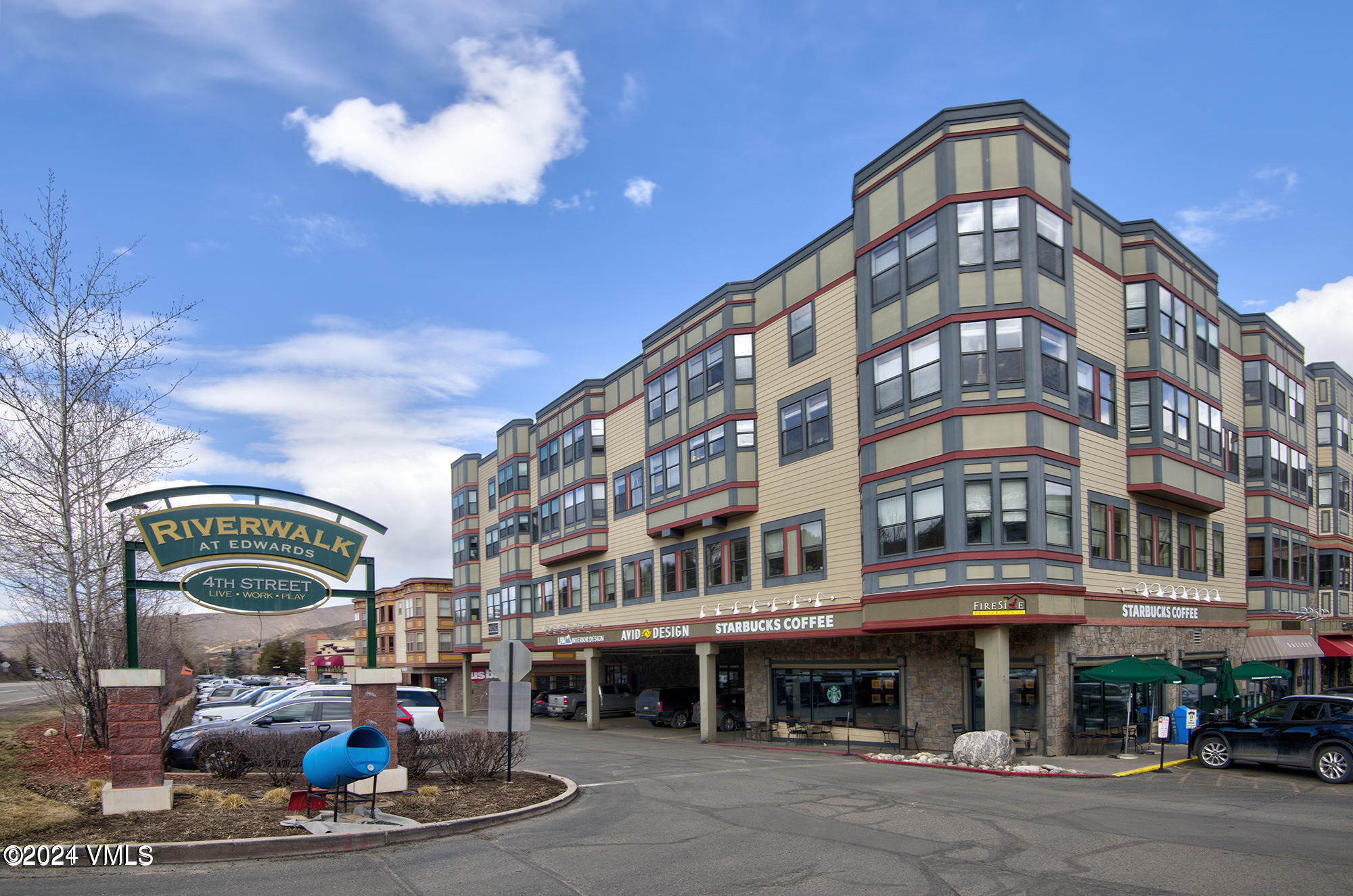 a front view of a building with street view