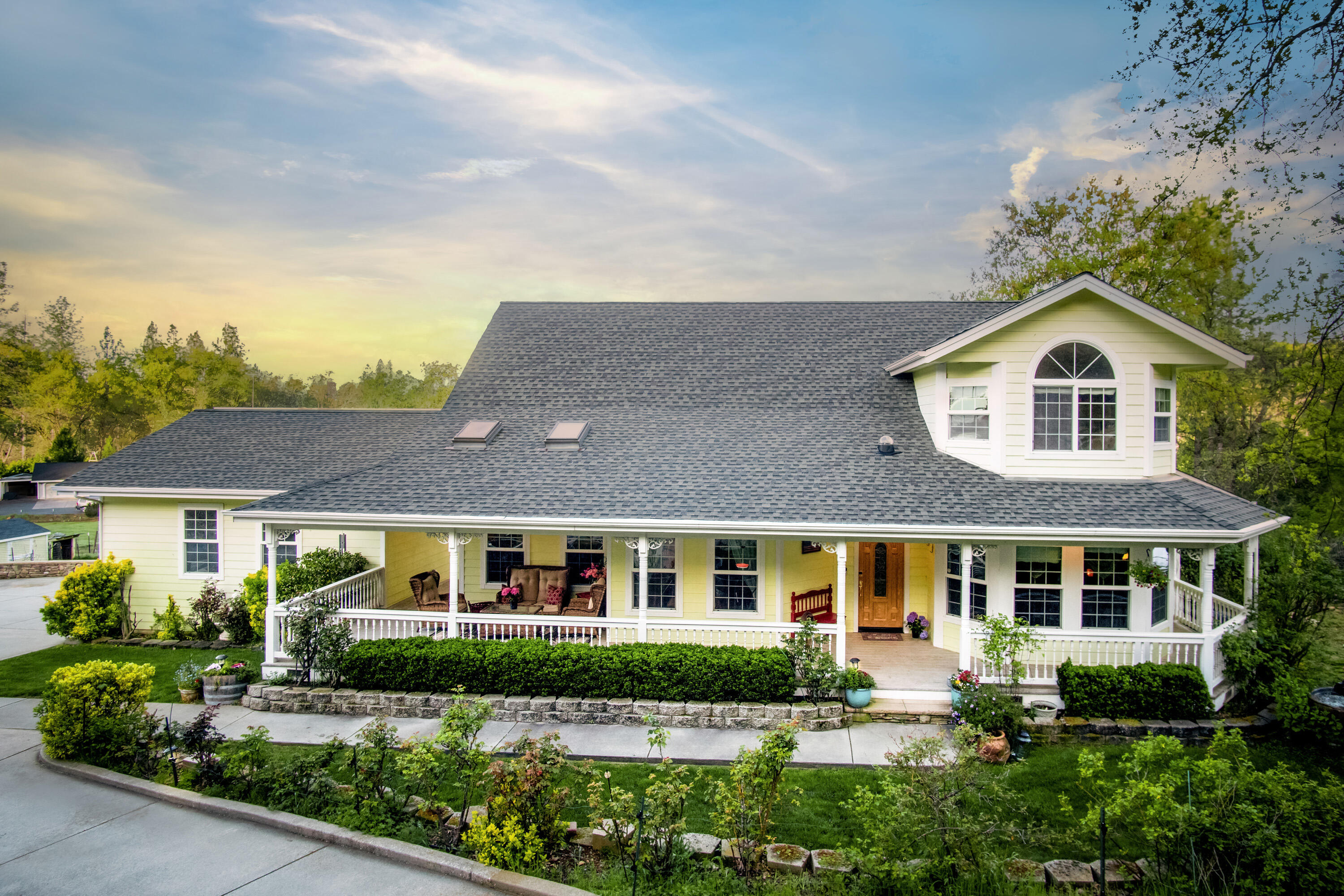 a front view of a house with a yard