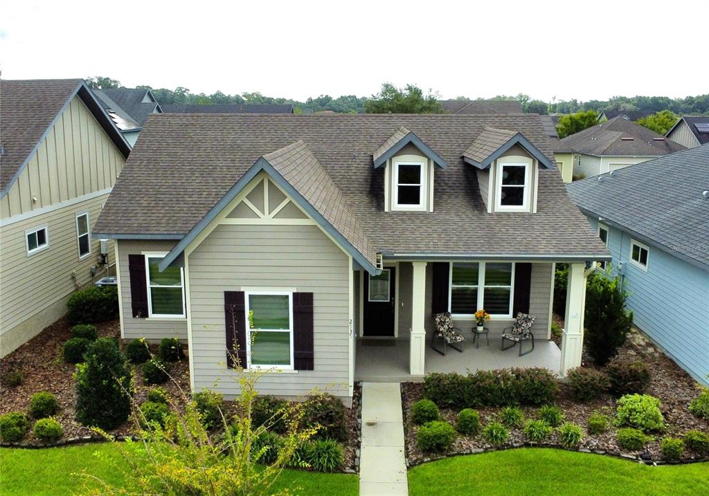 a view of a yard in front of house