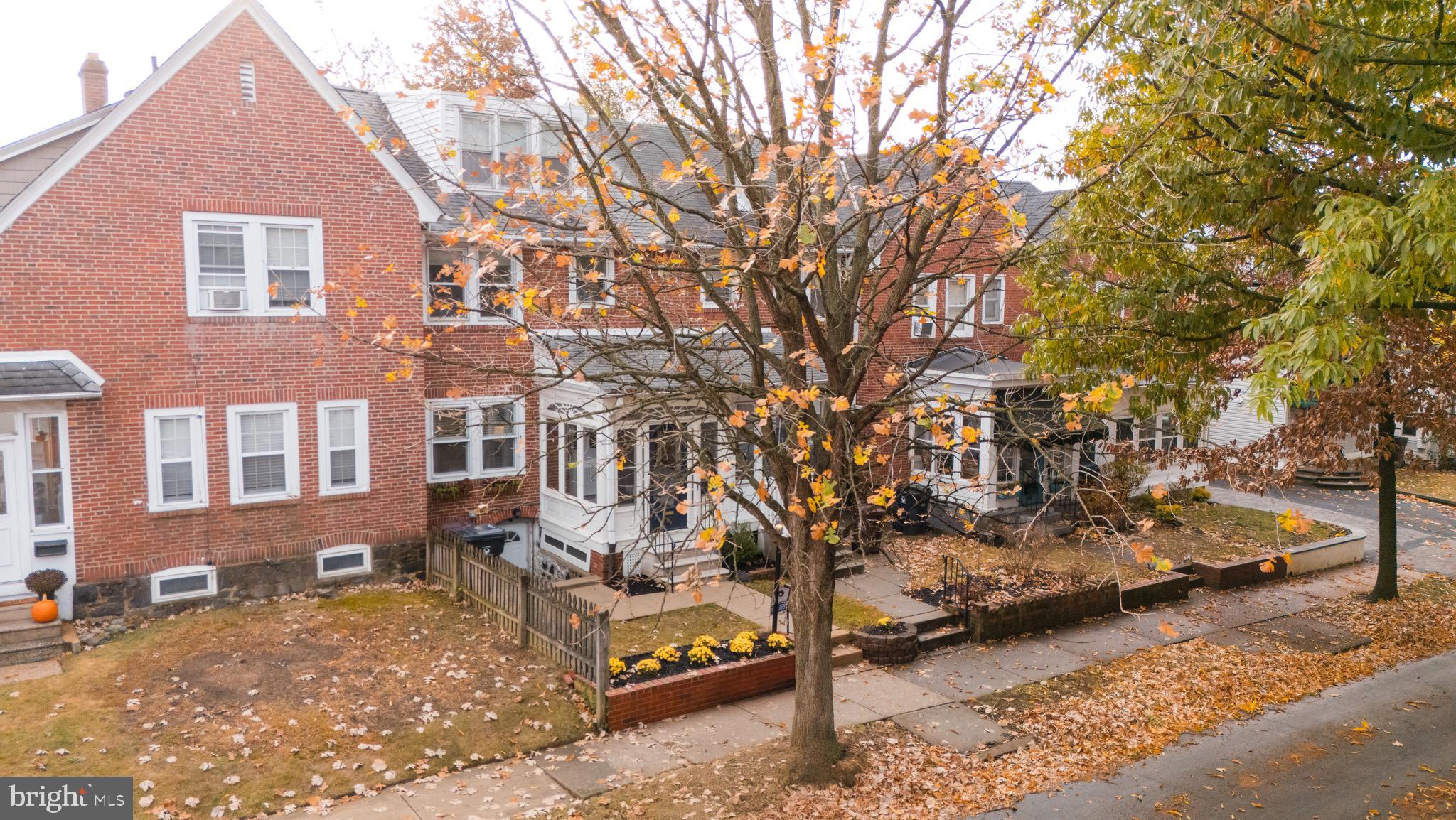 a view of a building with a yard