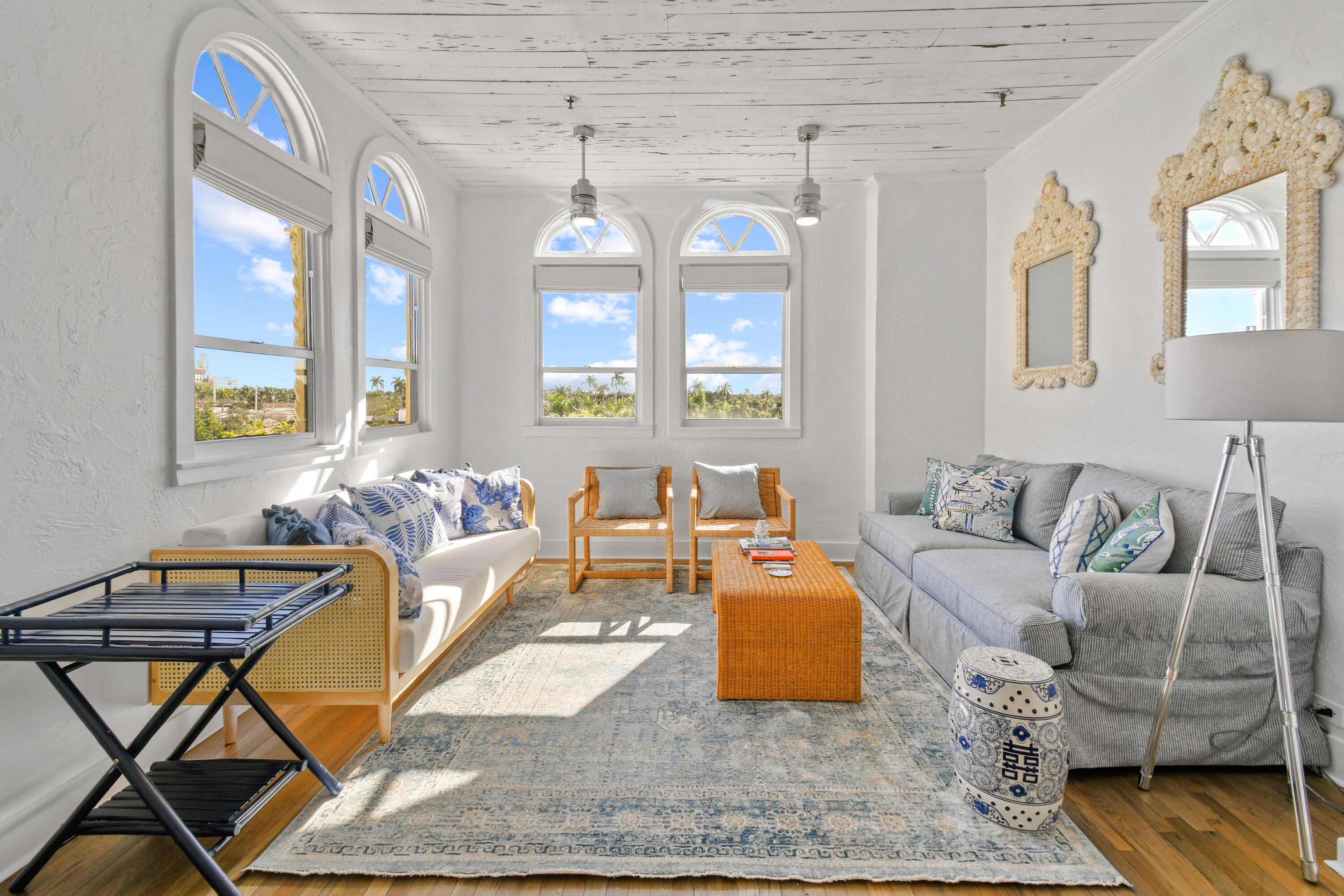 a living room with furniture and a table