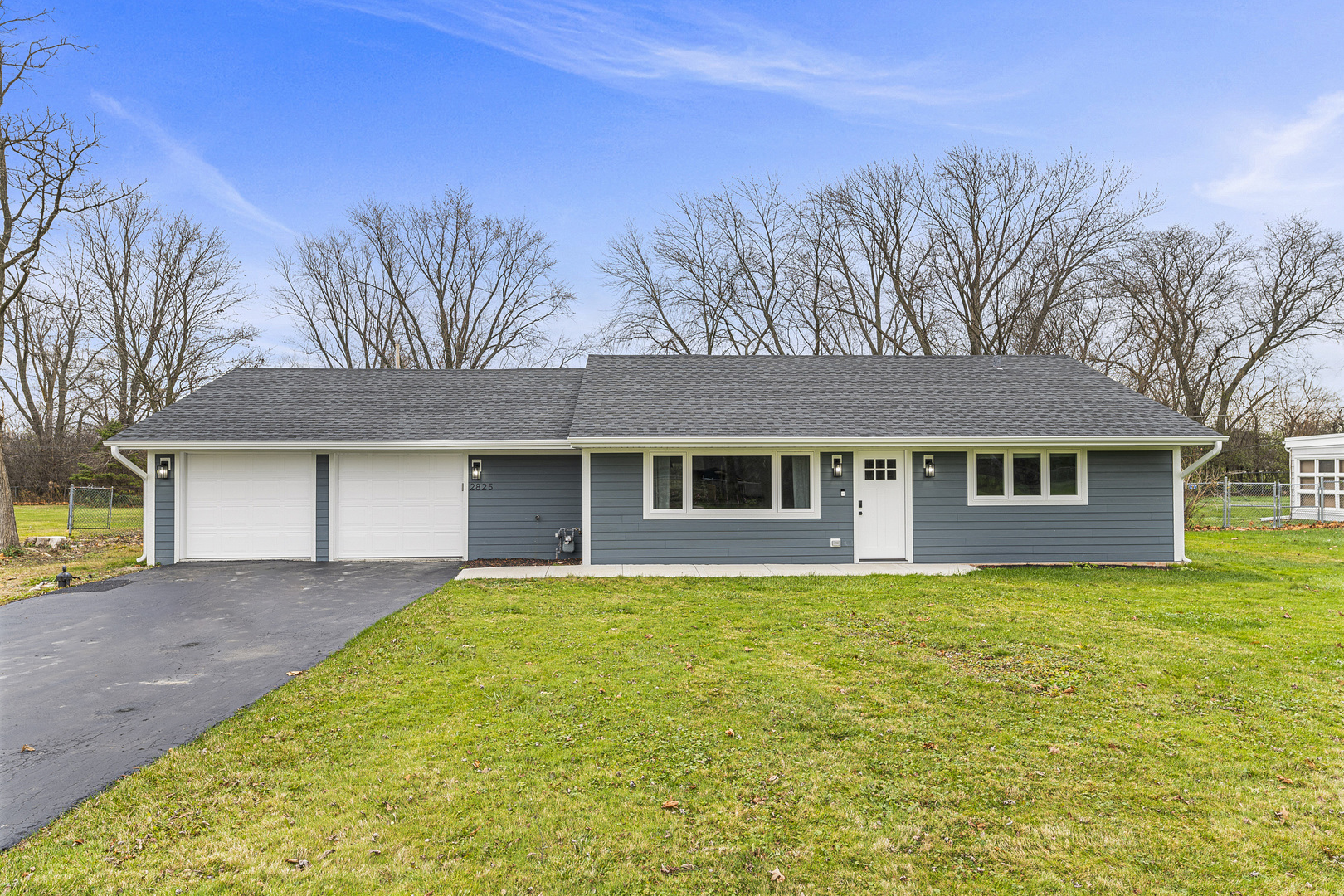 front view of a house with yard