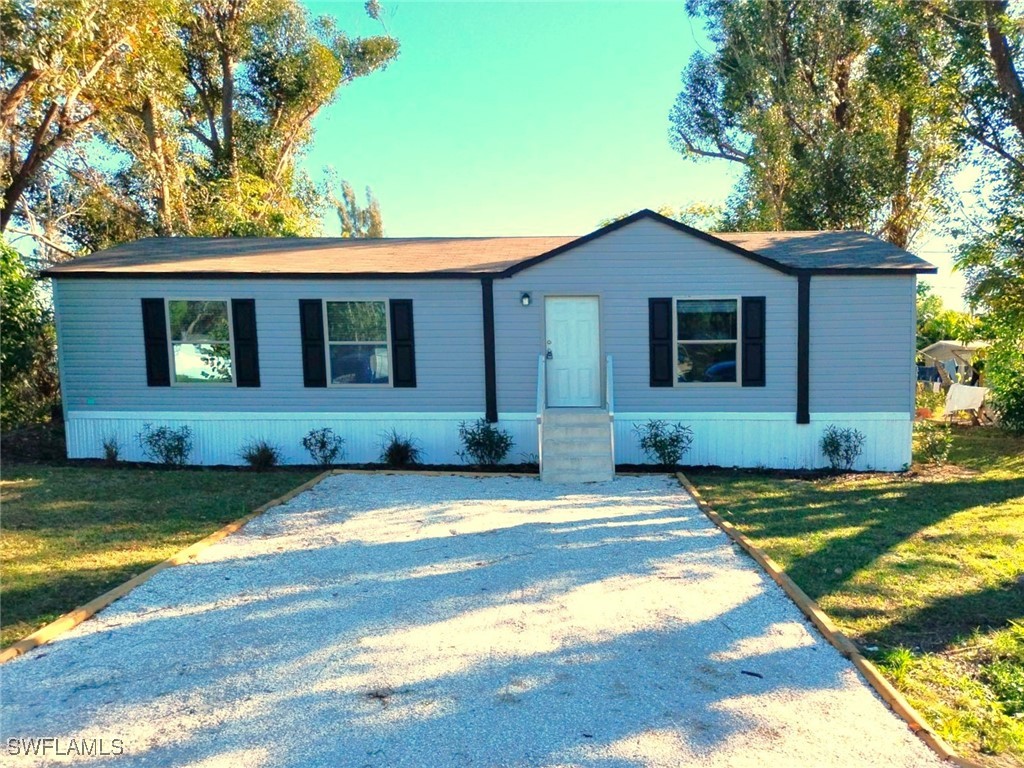 a view of a house with a swimming pool