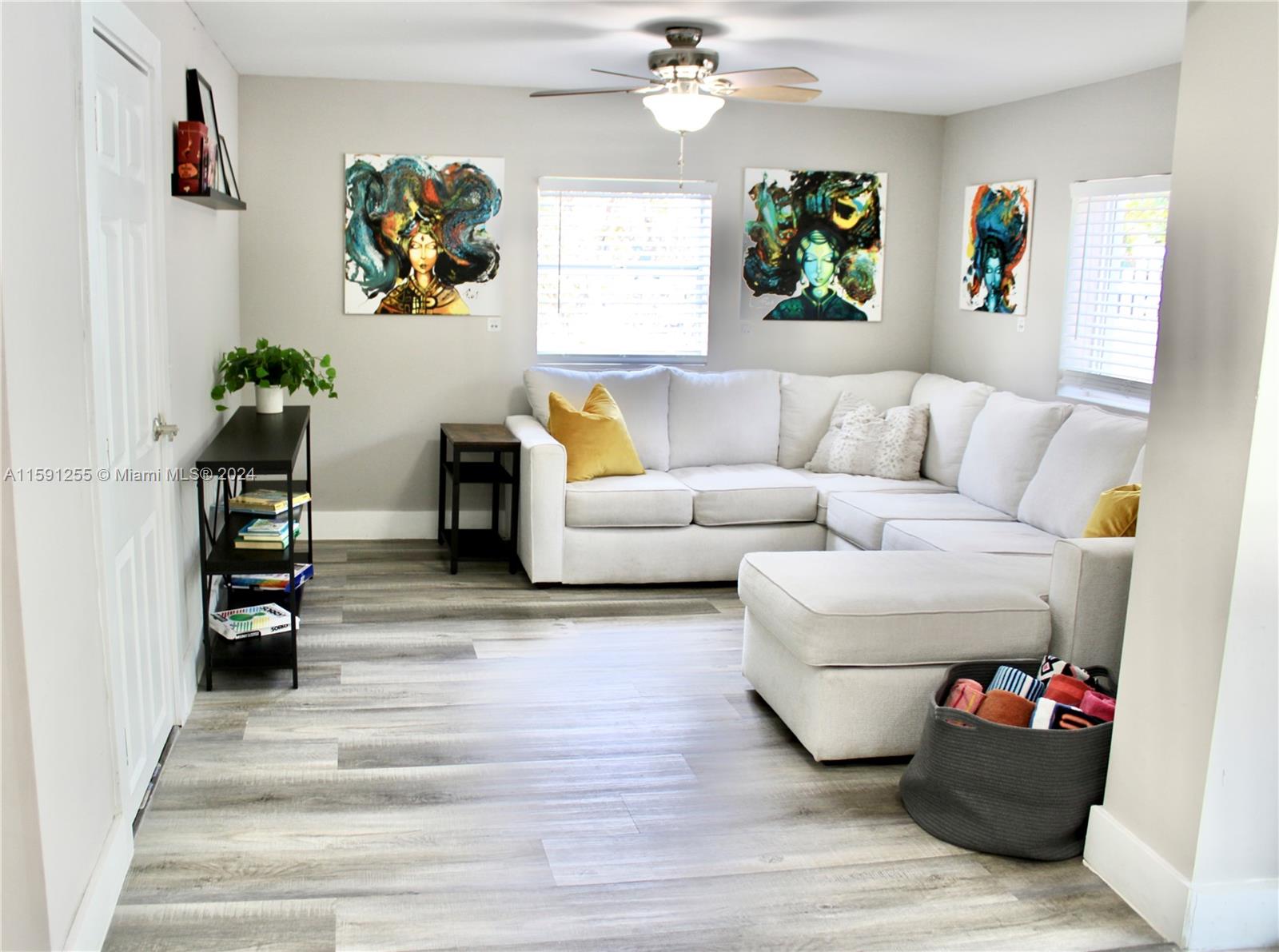 a living room with furniture and a couch