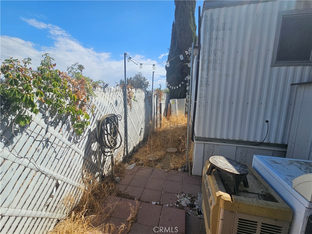 a view of a backyard with plants