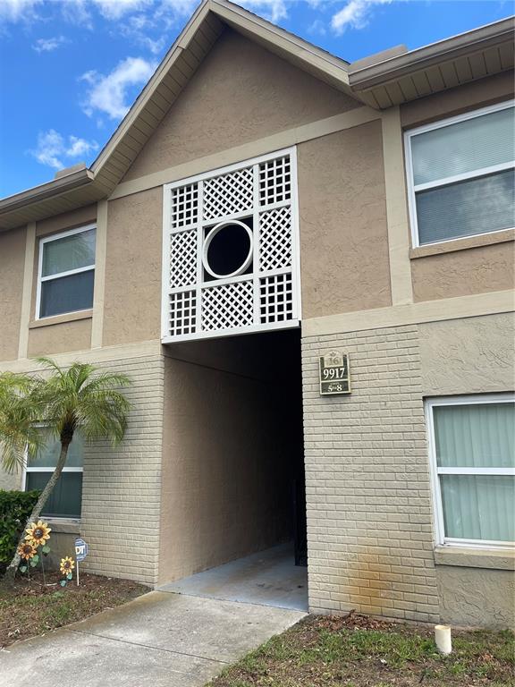 a front view of a house with garage