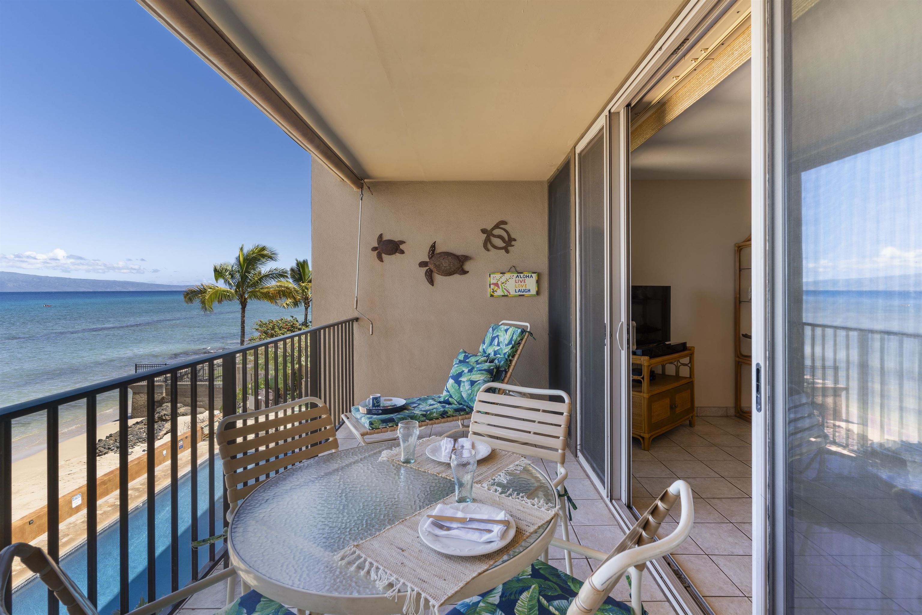 a view of a balcony dining area