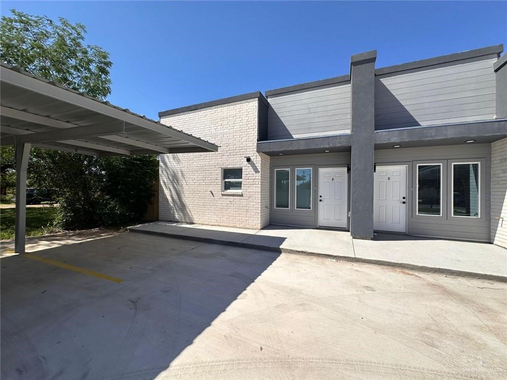 a view of a house with a patio