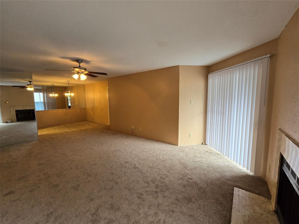 a view of a livingroom with a fireplace