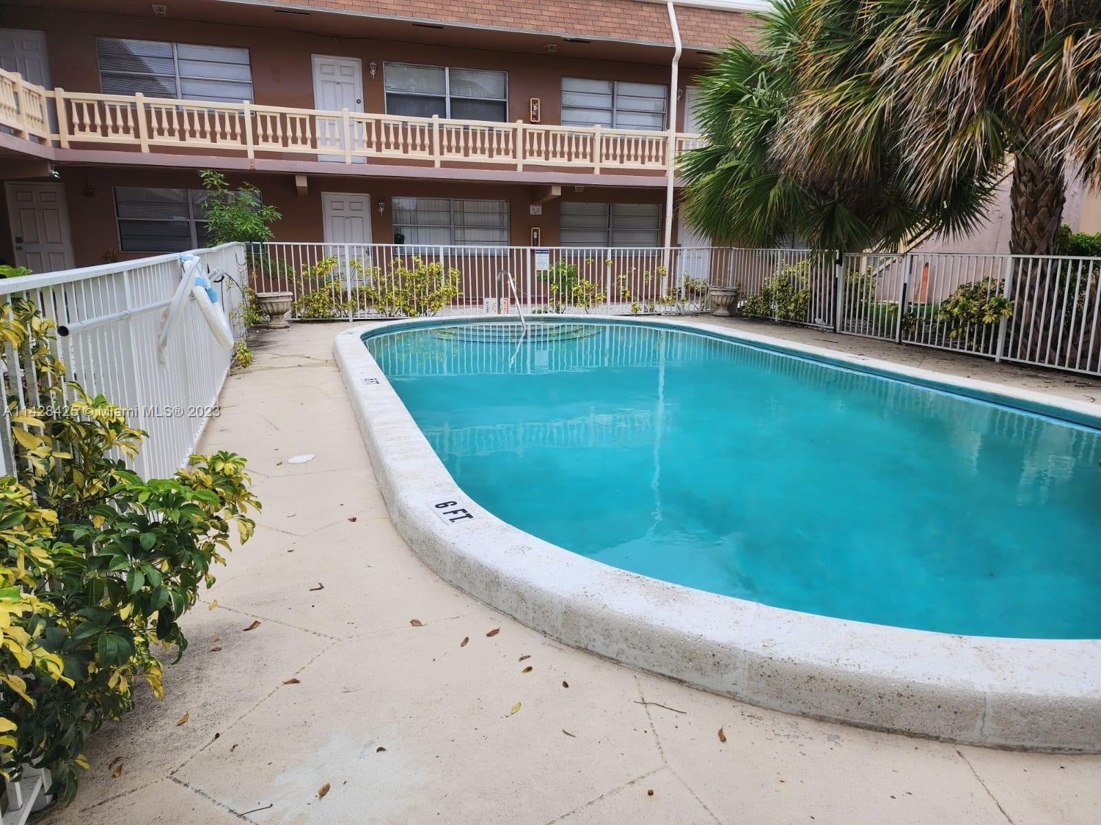 an outdoor view of swimming pool