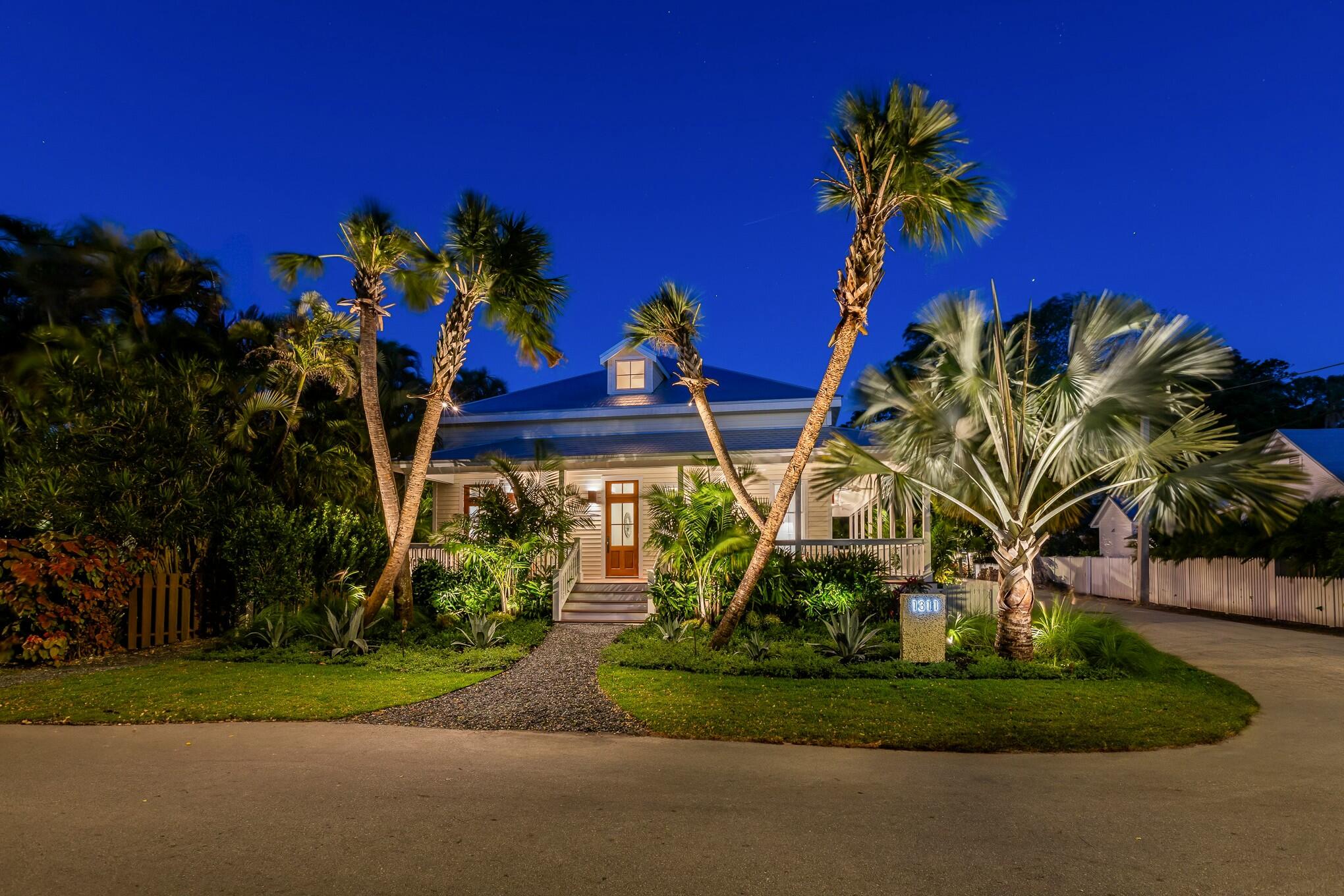 a view of a yard with a tree