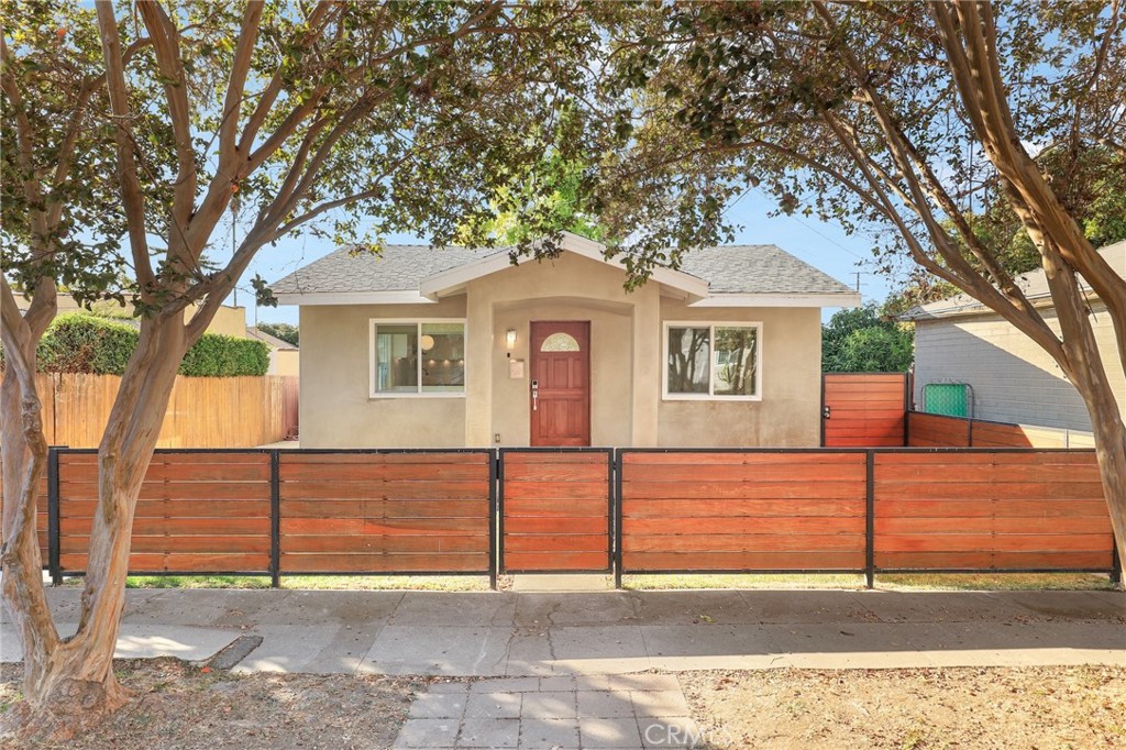 a front view of a house with a garage