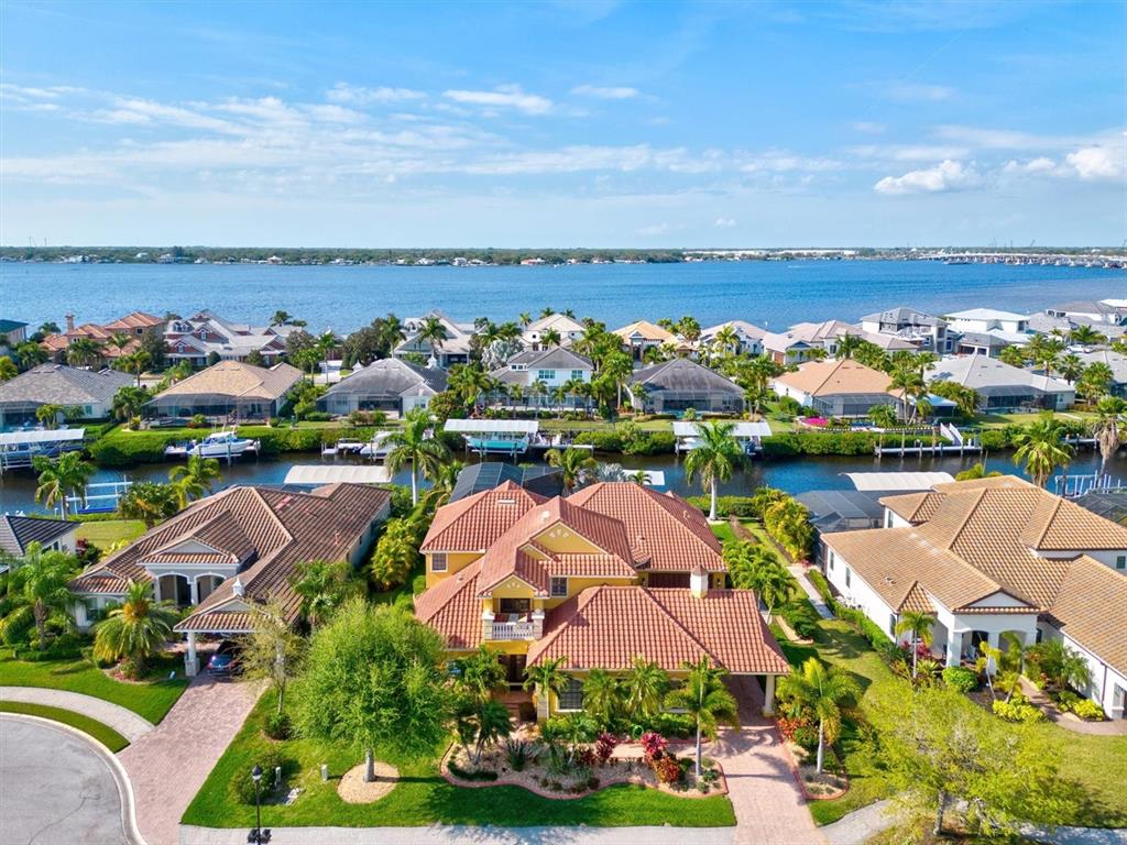 an aerial view of house with yard swimming pool and outdoor seating