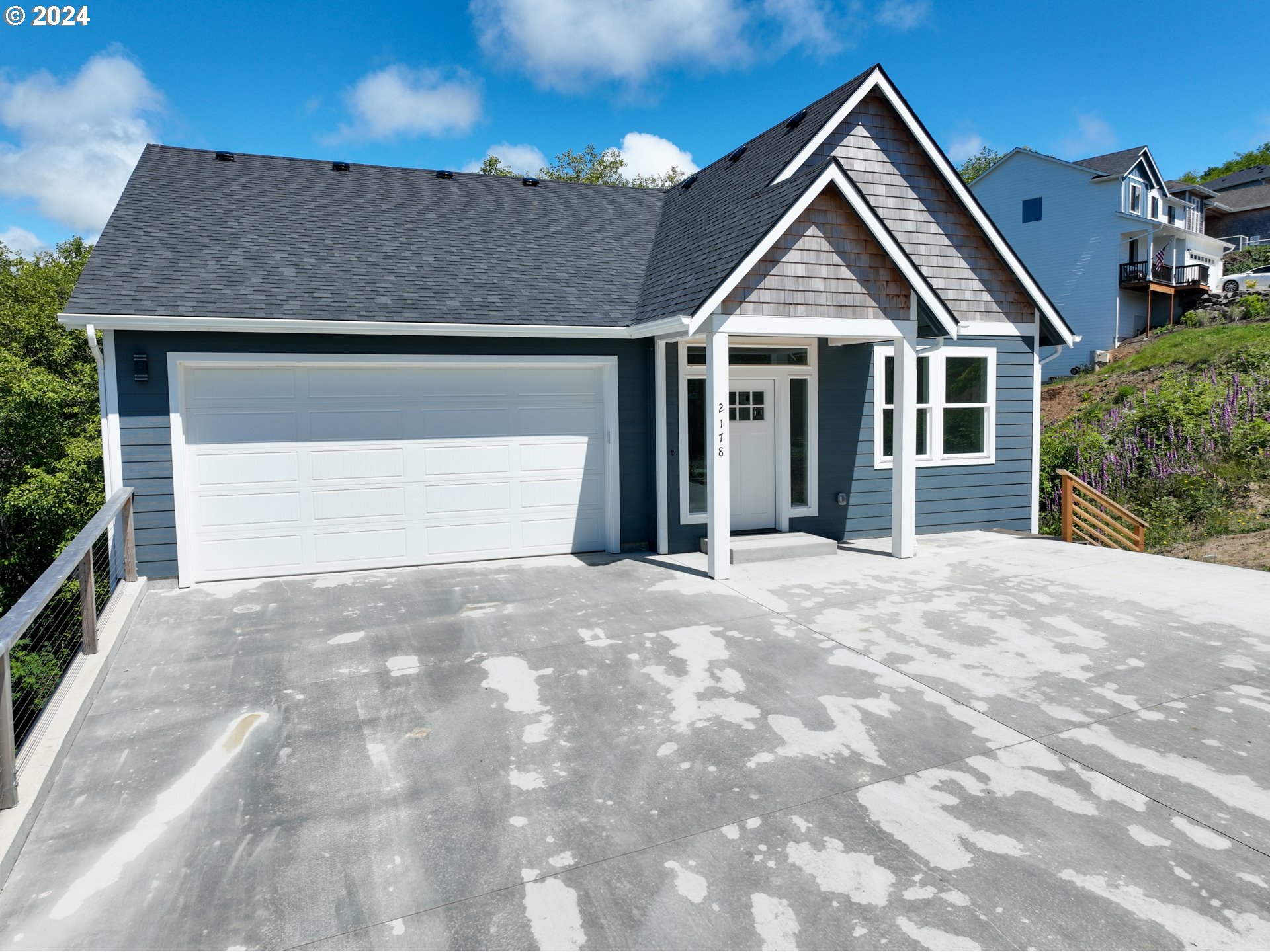 a view of house and yard