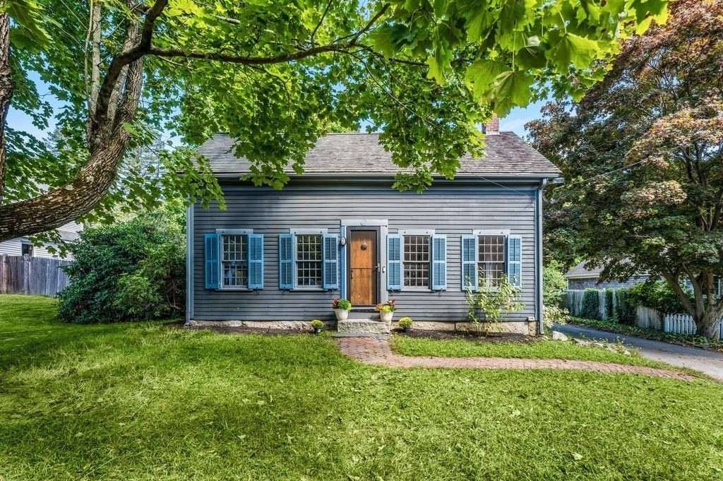 front view of a house with a yard