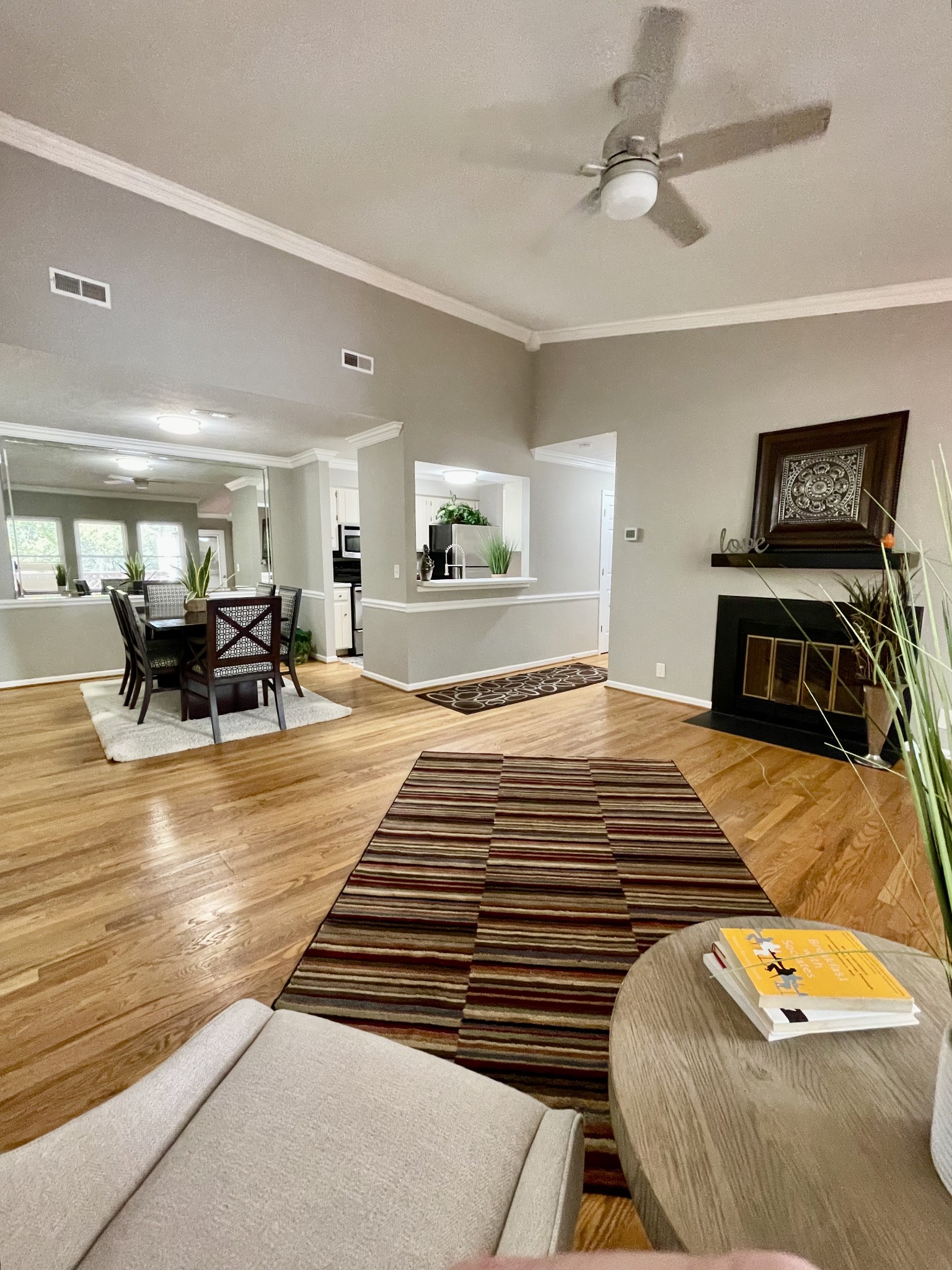 Welcome home! Condo has Hardwood Floors, tons of Natural Light, Fireplace and freshly painted in Sherwin Williams "Mindful Gray". (Note: Building "C" is marked 131 - 140 and Condo 139 is on second floor, on back right.)