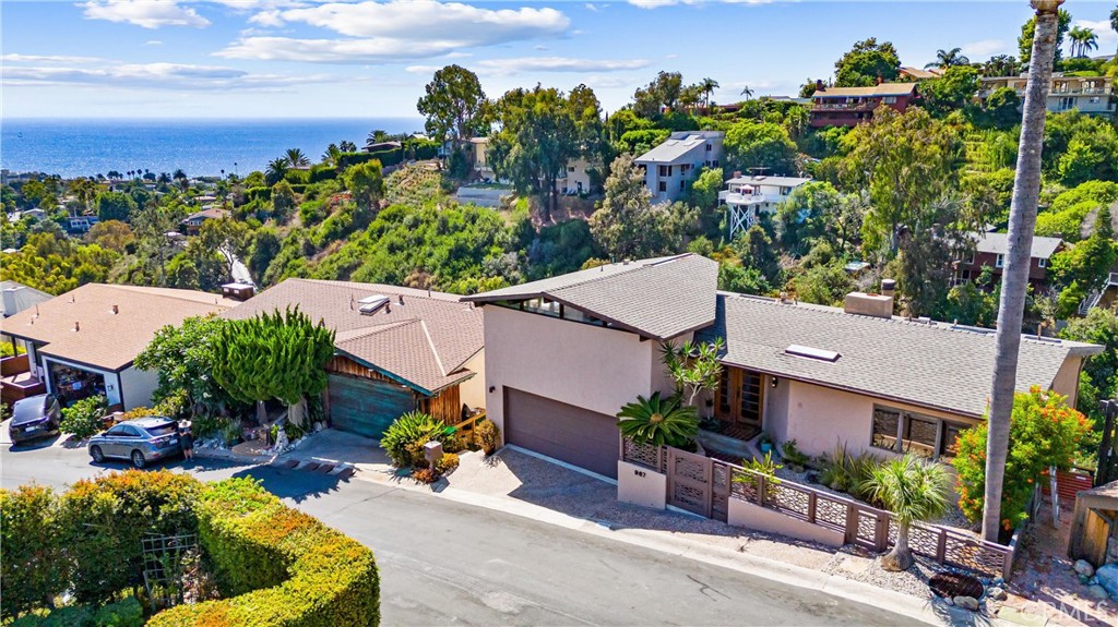 an aerial view of a house with a garden