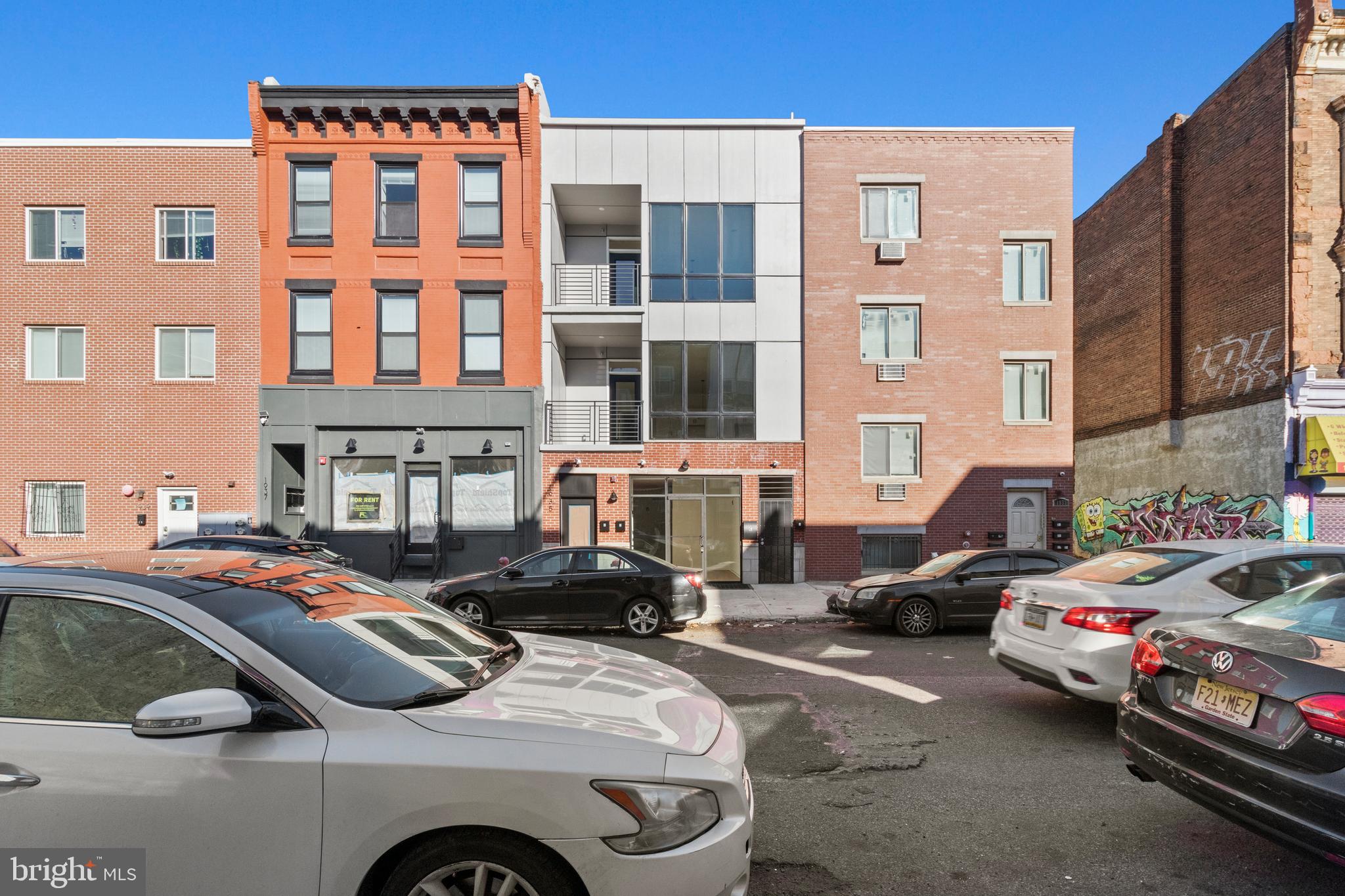 a cars parked in front of a building