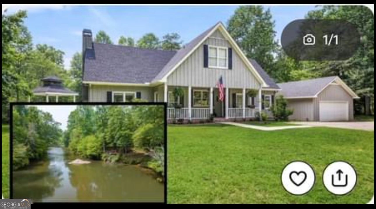 a view of a house with a yard