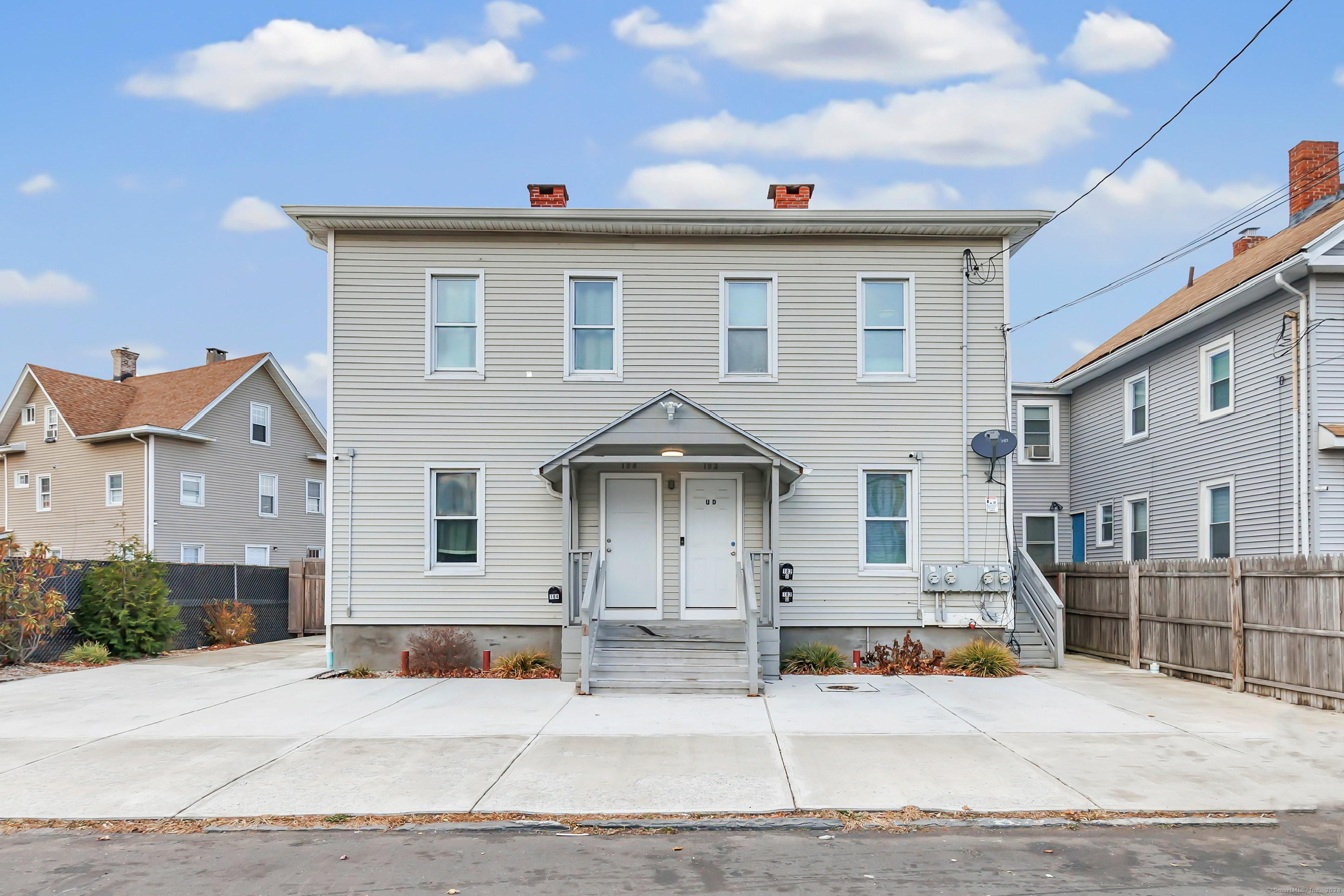 a front view of a house with garage