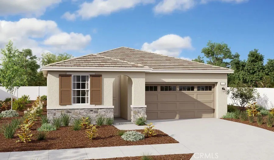 a front view of a house with a garage