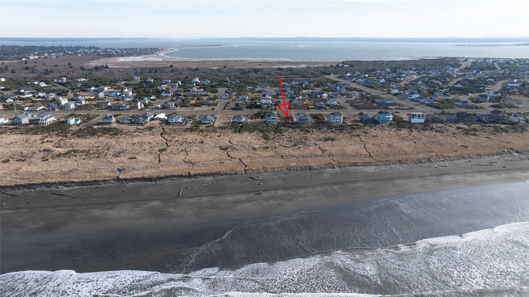 an aerial view of beach and city