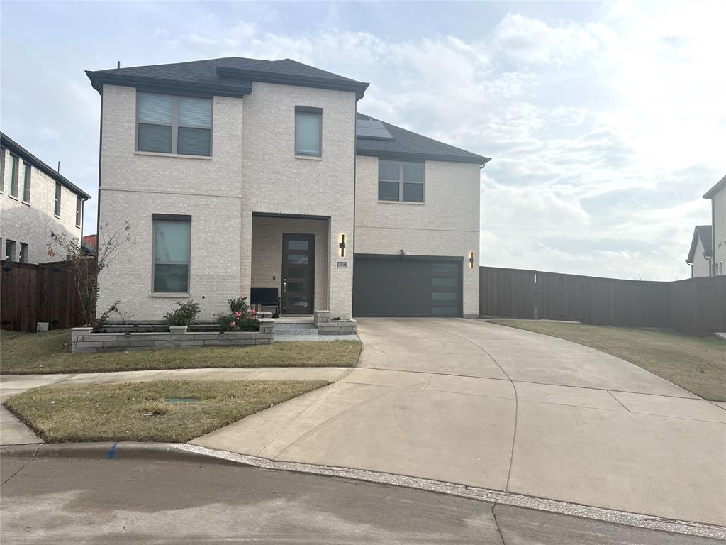 a view of house with outdoor space and fire pit