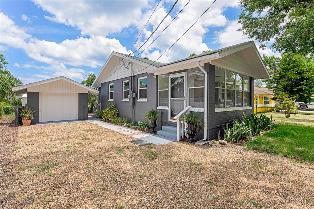 front view of a house with a small yard