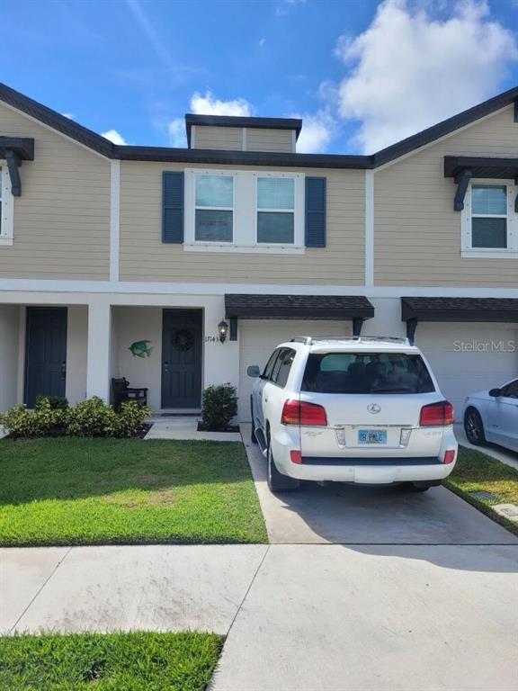 a car parked in front of a house