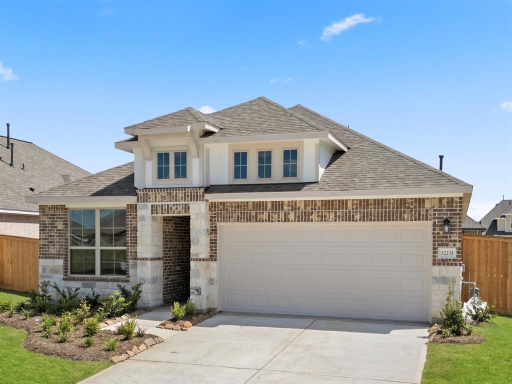 Welcome home to 32231 Cedar Crest Drive located in the Oakwood Estates community zoned to Waller ISD.