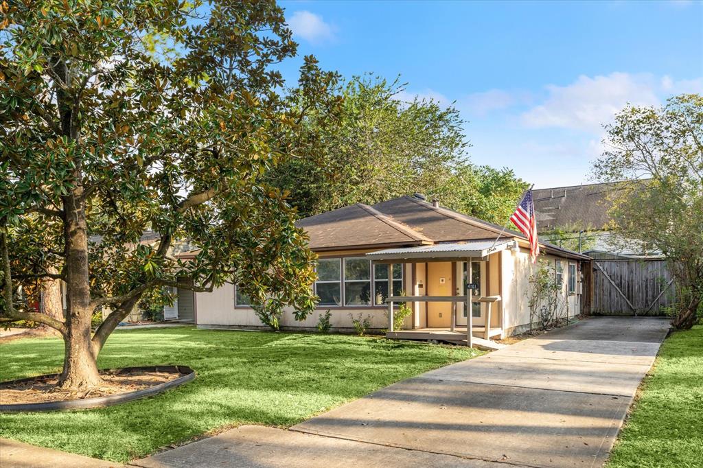 front view of a house with a yard