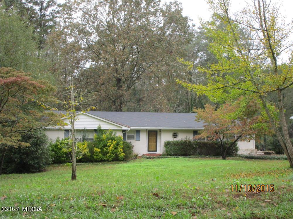 a house view with a garden space