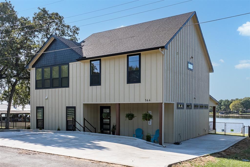 a front view of a house with a garage