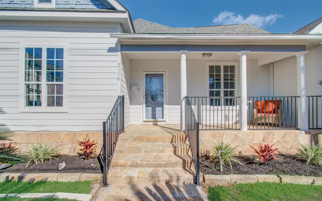 a front view of a house with a porch